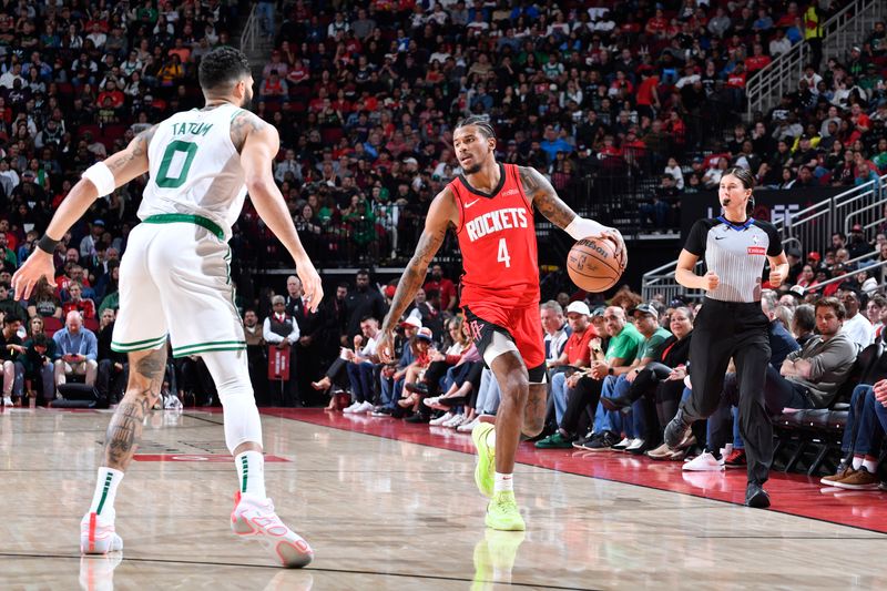 HOUSTON, TX - JANUARY 3:  Jalen Green #4 of the Houston Rockets dribbles the ball during the game against the Boston Celtics on January 3, 2025 at the Toyota Center in Houston, Texas. NOTE TO USER: User expressly acknowledges and agrees that, by downloading and or using this photograph, User is consenting to the terms and conditions of the Getty Images License Agreement. Mandatory Copyright Notice: Copyright 2025 NBAE (Photo by Logan Riely/NBAE via Getty Images)