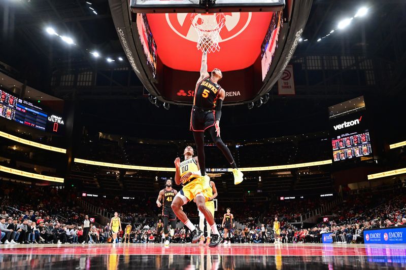 ATLANTA, GA - JANUARY 12: Dejounte Murray #5 of the Atlanta Hawks dunks the ball during the game against the Indiana Pacers on January 12, 2024 at State Farm Arena in Atlanta, Georgia.  NOTE TO USER: User expressly acknowledges and agrees that, by downloading and/or using this Photograph, user is consenting to the terms and conditions of the Getty Images License Agreement. Mandatory Copyright Notice: Copyright 2024 NBAE (Photo by Adam Hagy/NBAE via Getty Images)