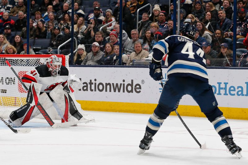 Jan 19, 2024; Columbus, Ohio, USA; Columbus Blue Jackets defenseman Erik Gudbranson (44) shoots on goal against the New Jersey Devils during the third period at Nationwide Arena. Mandatory Credit: Russell LaBounty-USA TODAY Sports