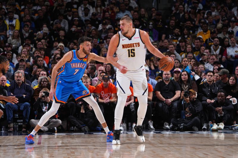 DENVER, CO - OCTOBER 24: Nikola Jokic #15 of the Denver Nuggets dribbles the ball during the game against the Oklahoma City Thunder on October 24, 2024 at Ball Arena in Denver, Colorado. NOTE TO USER: User expressly acknowledges and agrees that, by downloading and/or using this Photograph, user is consenting to the terms and conditions of the Getty Images License Agreement. Mandatory Copyright Notice: Copyright 2024 NBAE (Photo by Garrett Ellwood/NBAE via Getty Images)