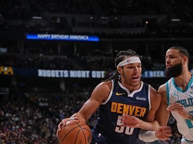 DENVER, CO - JANUARY 1: Aaron Gordon #50 of the Denver Nuggets handles the ball during the game against the Charlotte Hornets on January 1, 2024 at the Ball Arena in Denver, Colorado. NOTE TO USER: User expressly acknowledges and agrees that, by downloading and/or using this Photograph, user is consenting to the terms and conditions of the Getty Images License Agreement. Mandatory Copyright Notice: Copyright 2024 NBAE (Photo by Bart Young/NBAE via Getty Images)