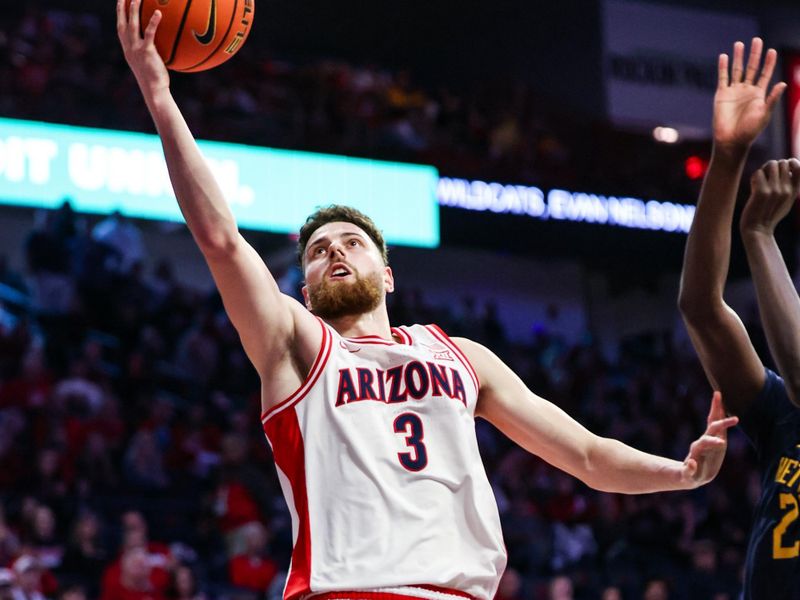 Jan 24, 2026; Tucson, Arizona, USA; Arizona Wildcats guard Anthony Dell’Orso (3) makes a layup during the second half of the game against the West Virginia Mountaineers at McKale Memorial Center. Mandatory Credit: Aryanna Frank-Imagn Images