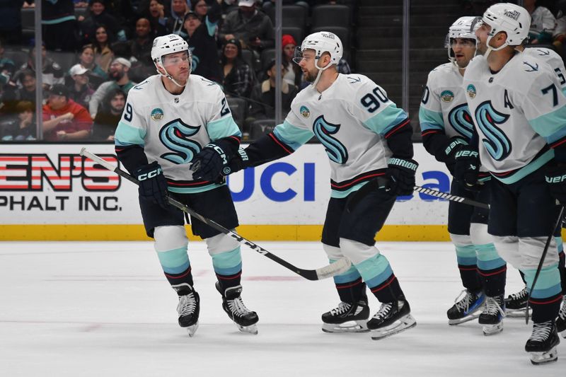 Dec 23, 2023; Anaheim, California, USA; Seattle Kraken defenseman Vince Dunn (29) celebrates his goal scored against the Anaheim Ducks with left wing Tomas Tatar (90) during the first period at Honda Center. Mandatory Credit: Gary A. Vasquez-USA TODAY Sports