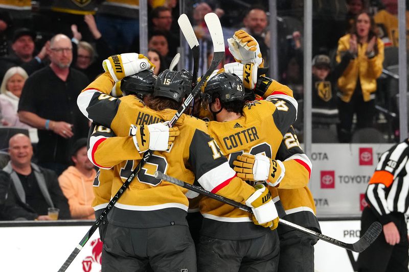 Mar 7, 2024; Las Vegas, Nevada, USA; Vegas Golden Knights right wing Michael Amadio (22) celebrates with team mates after scoring a goal against the Vancouver Canucks during the second period at T-Mobile Arena. Mandatory Credit: Stephen R. Sylvanie-USA TODAY Sports