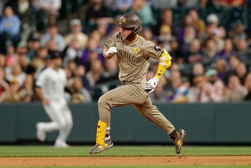 Apr 24, 2024; Denver, Colorado, USA; San Diego Padres shortstop Ha-Seong Kim (7) runs to second on a single after an error by the Colorado Rockies in the sixth inning at Coors Field. Mandatory Credit: Isaiah J. Downing-USA TODAY Sports