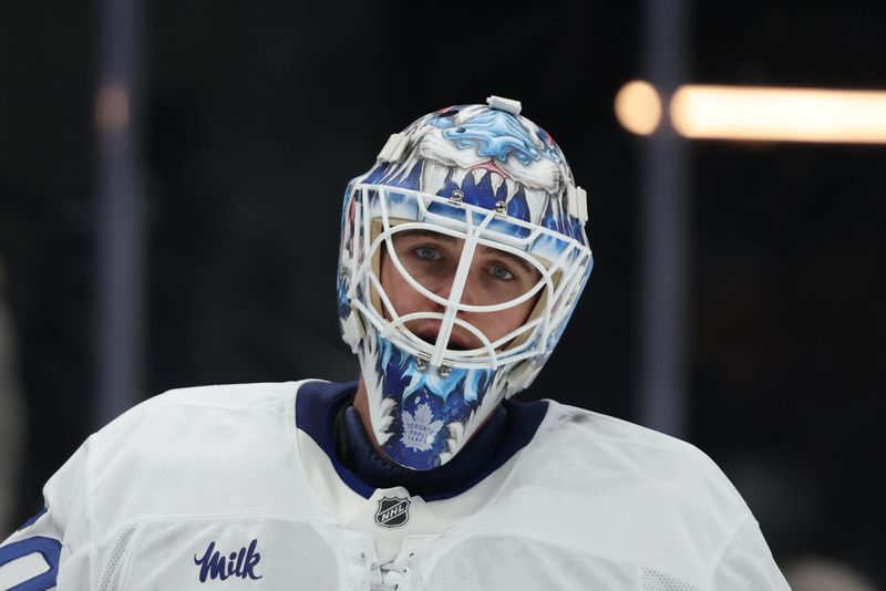 Mar 10, 2025; Salt Lake City, Utah, USA; Toronto Maple Leafs goaltender Joseph Woll prepares for the start of the third period against the Utah Hockey Club at Delta Center. Mandatory Credit: Rob Gray-Imagn Images