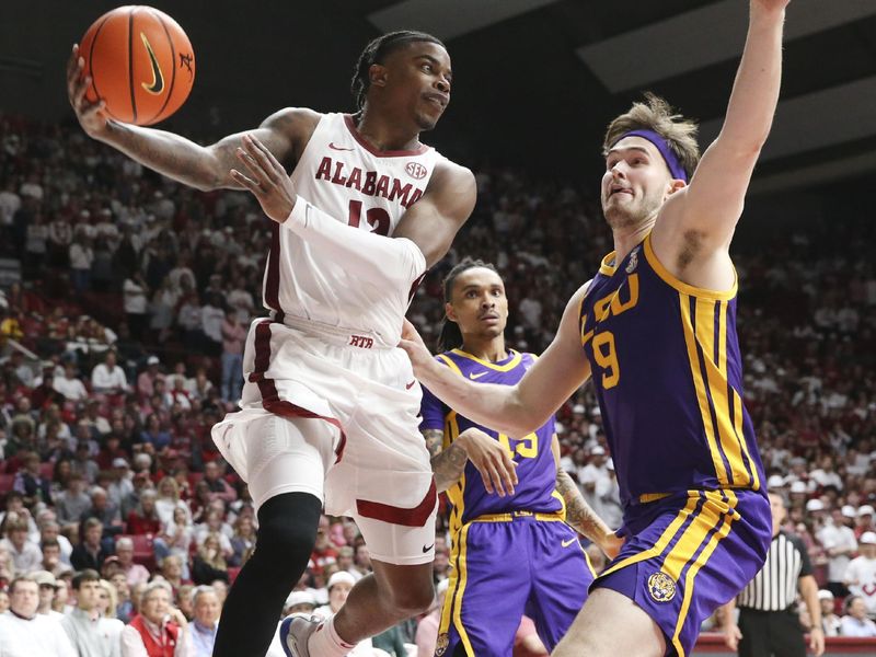 Jan 27, 2024; Tuscaloosa, Alabama, USA;  LSU forward Will Baker (9) forces a pass by Alabama guard Latrell Wrightsell Jr. (12) as he drives to the baseline at Coleman Coliseum. Alabama defeated LSU 109-88. Mandatory Credit: Gary Cosby Jr.-USA TODAY Sports