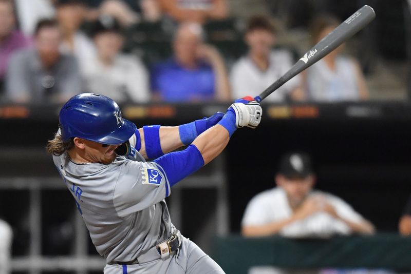 Jul 30, 2024; Chicago, Illinois, USA; Kansas City Royals shortstop Bobby Witt Jr. (7) hits an RBI single during the eighth inning against the Chicago White Sox at Guaranteed Rate Field. Mandatory Credit: Patrick Gorski-USA TODAY Sports