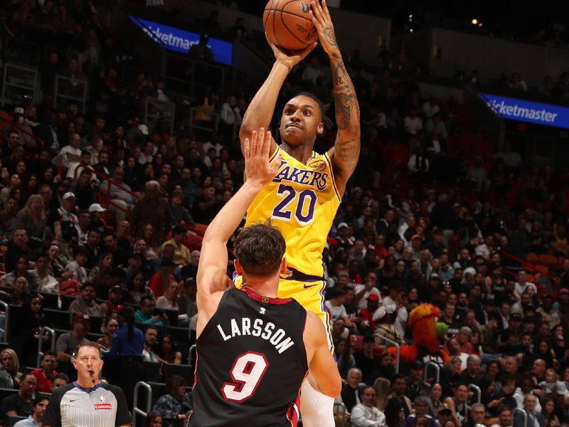 MIAMI, FL - DECEMBER 4: Maxwell Lewis #20 of the Los Angeles Lakers shoots the ball during the game against the Miami Heat on December 4, 2024 at Kaseya Center in Miami, Florida. NOTE TO USER: User expressly acknowledges and agrees that, by downloading and or using this Photograph, user is consenting to the terms and conditions of the Getty Images License Agreement. Mandatory Copyright Notice: Copyright 2024 NBAE (Photo by Issac Baldizon/NBAE via Getty Images)