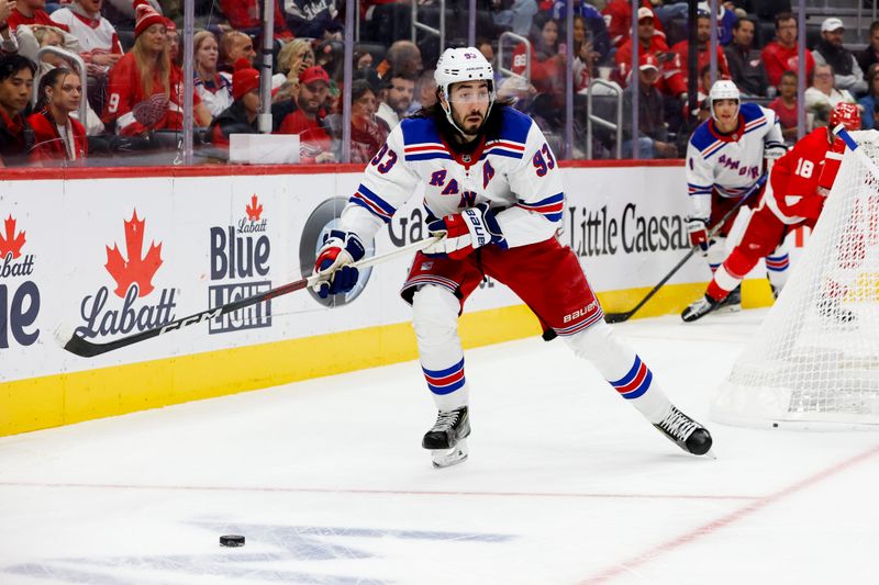 Oct 17, 2024; Detroit, Michigan, USA;  New York Rangers center Mika Zibanejad (93) skates with the puck in the second period against the Detroit Red Wings at Little Caesars Arena. Mandatory Credit: Rick Osentoski-Imagn Images