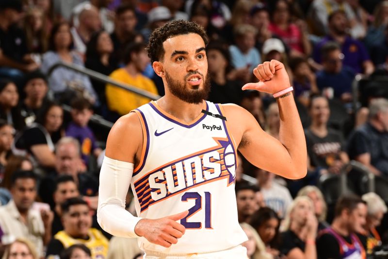 PHOENIX, AZ - OCTOBER 17: Tyus Jones #21 of the Phoenix Suns looks on during the game against the Los Angeles Lakers on October 17, 2024 at Footprint Center in Phoenix, Arizona. NOTE TO USER: User expressly acknowledges and agrees that, by downloading and or using this photograph, user is consenting to the terms and conditions of the Getty Images License Agreement. Mandatory Copyright Notice: Copyright 2024 NBAE (Photo by Kate Frese/NBAE via Getty Images)