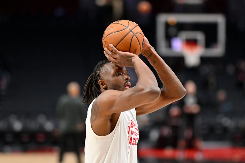 PORTLAND, OREGON - JANUARY 17: Jerami Grant #9 of the Portland Trail Blazers warms up before the game against the Brooklyn Nets at the Moda Center on January 17, 2024 in Portland, Oregon. NOTE TO USER: User expressly acknowledges and agrees that, by downloading and or using this photograph, User is consenting to the terms and conditions of the Getty Images License Agreement. (Photo by Alika Jenner/Getty Images)