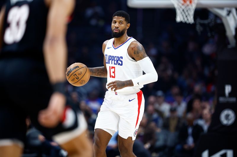 LOS ANGELES, CALIFORNIA - DECEMBER 11:  Paul George #13 of the LA Clippers at Crypto.com Arena on December 11, 2023 in Los Angeles, California.  NOTE TO USER: User expressly acknowledges and agrees that, by downloading and/or using this photograph, user is consenting to the terms and conditions of the Getty Images License Agreement. (Photo by Ronald Martinez/Getty Images)