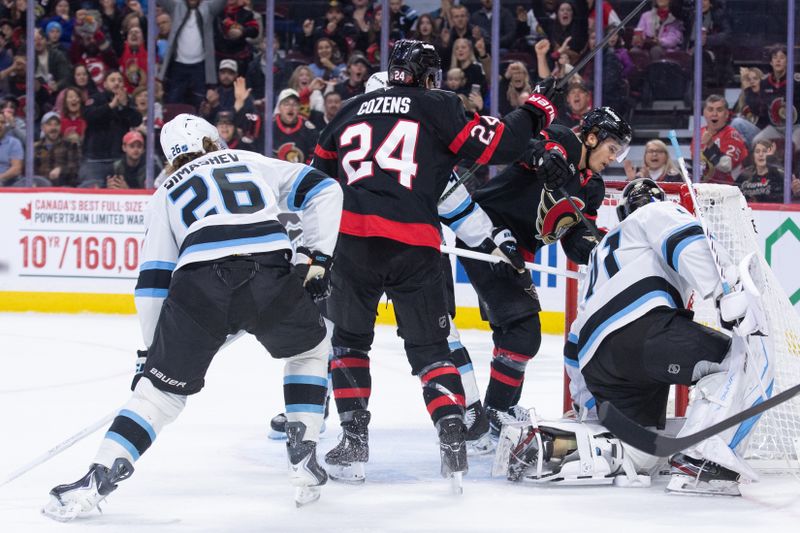 Nov 9, 2025; Ottawa, Ontario, CAN; Ottawa Senators center Ridly Greig (71) scores against Utah Mammoth goalie Vitek Vanacek (41) in the first period at the Canadian Tire Centre. Mandatory Credit: Marc DesRosiers-IMAGN Images