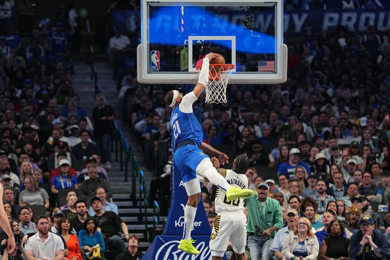 DALLAS, TX - MARCH 5: Daniel Gafford #21 of the Dallas Mavericks dunks the ball during the game against the Indiana Pacers on March 5, 2024 at the American Airlines Center in Dallas, Texas. NOTE TO USER: User expressly acknowledges and agrees that, by downloading and or using this photograph, User is consenting to the terms and conditions of the Getty Images License Agreement. Mandatory Copyright Notice: Copyright 2024 NBAE (Photo by Glenn James/NBAE via Getty Images)