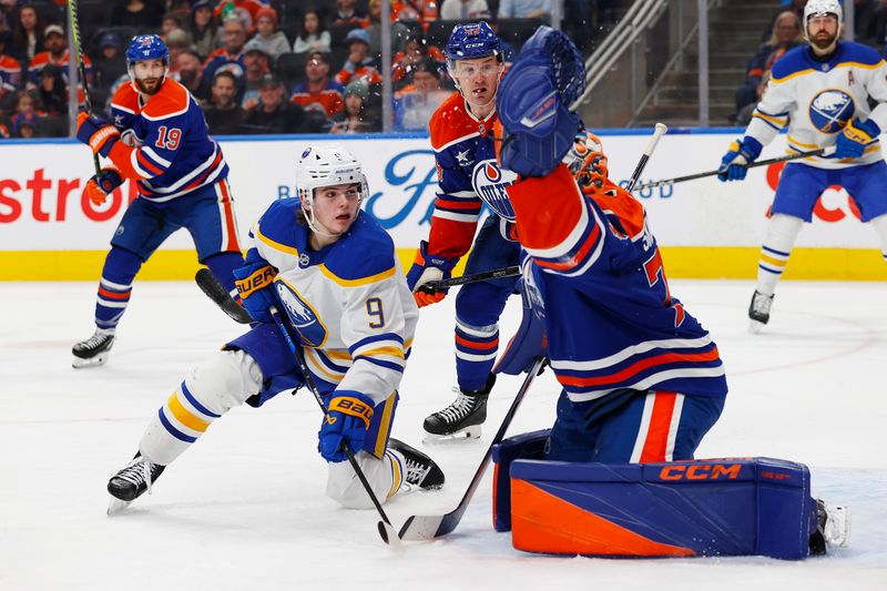 Jan 25, 2025; Edmonton, Alberta, CAN;  Buffalo Sabres forward Zach Benson (9) looks for a rebound in front of Edmonton Oilers goaltender Stuart Skinner (74) during the second period at Rogers Place. Mandatory Credit: Perry Nelson-Imagn Images