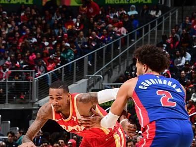 ATLANTA, GA - DECEMBER 18: Dejounte Murray #5 of the Atlanta Hawks goes to the basket during the game on December 18, 2023 at State Farm Arena in Atlanta, Georgia.  NOTE TO USER: User expressly acknowledges and agrees that, by downloading and/or using this Photograph, user is consenting to the terms and conditions of the Getty Images License Agreement. Mandatory Copyright Notice: Copyright 2023 NBAE (Photo by Scott Cunningham/NBAE via Getty Images)