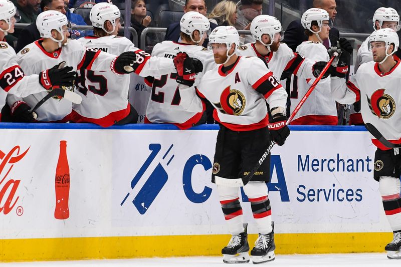 Oct 26, 2023; Elmont, New York, USA; Ottawa Senators bench celebrates the goal by Ottawa Senators right wing Claude Giroux (28) against the New York Islanders  with the against the Oduring the second period at UBS Arena. Mandatory Credit: Dennis Schneidler-USA TODAY Sports