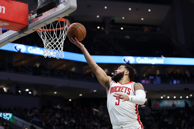 MILWAUKEE, WISCONSIN - NOVEMBER 18: Fred VanVleet #5 of the Houston Rockets takes a shot during the first half of a game against the Milwaukee Bucks at Fiserv Forum on November 18, 2024 in Milwaukee, Wisconsin. NOTE TO USER: User expressly acknowledges and agrees that, by downloading and or using this photograph, User is consenting to the terms and conditions of the Getty Images License Agreement. (Photo by Stacy Revere/Getty Images)