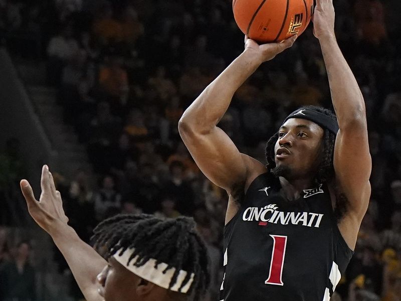 Jan 13, 2024; Waco, Texas, USA; Cincinnati Bearcats guard Day Day Thomas (1) shoots a three-point shot against the Baylor Bears during the first half at Paul and Alejandra Foster Pavilion. Mandatory Credit: Raymond Carlin III-USA TODAY Sports