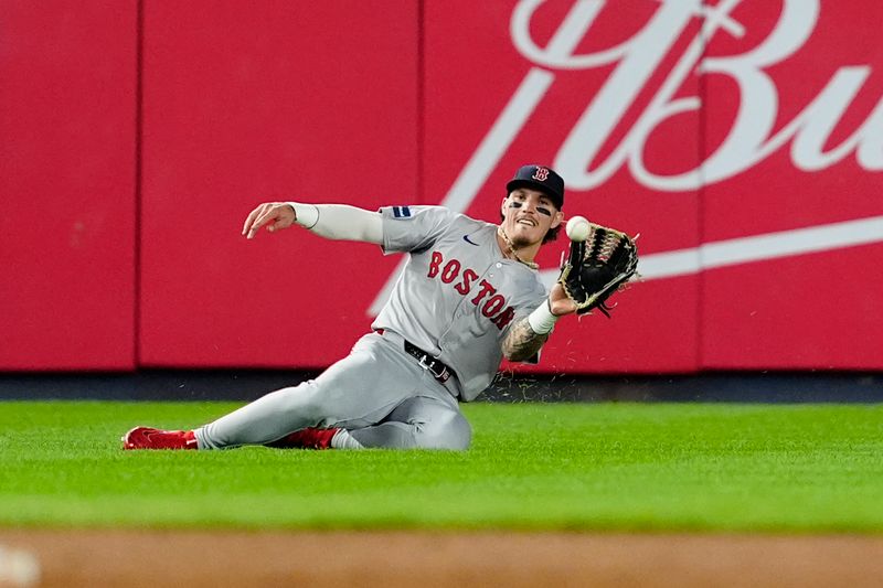 Sep 12, 2024; Bronx, New York, USA; Boston Red Sox left fielder Jarren Duran (16) catches a line drive hit by New York Yankees second baseman Gleyber Torres (not pictured) during the fifth inning at Yankee Stadium. Mandatory Credit: Gregory Fisher-Imagn Images