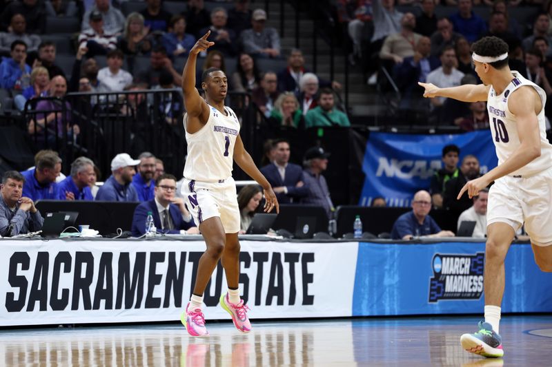 Mar 16, 2023; Sacramento, CA, USA; Northwestern Wildcats guard Chase Audige (1) celebrates after scoring against the Boise State Broncos  in the first half at Golden 1 Center. Mandatory Credit: Kelley L Cox-USA TODAY Sports