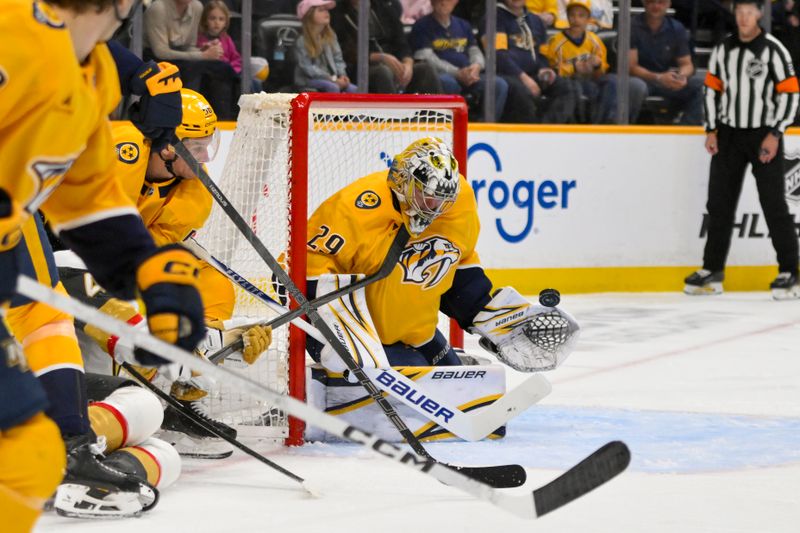 Mar 21, 2026; Nashville, Tennessee, USA; Nashville Predators goaltender Justus Annunen (29) blocks the shot of Vegas Golden Knights left wing Ivan Barbashev (49) during the second period at Bridgestone Arena. Mandatory Credit: Steve Roberts-Imagn Images Mar 21, 2026; Nashville, Tennessee, USA; Nashville Predators goaltender Justus Annunen (29) blocks the shot of Vegas Golden Knights left wing Ivan Barbashev (49) during the second period at Bridgestone Arena. Mandatory Credit: Steve Roberts-Imagn Images