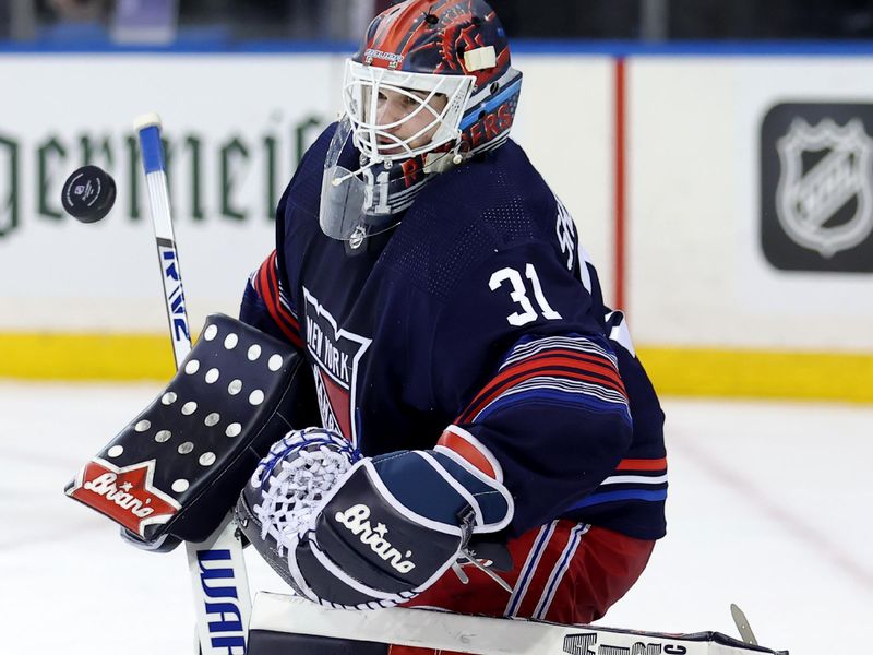 Jan 14, 2024; New York, New York, USA; New York Rangers goaltender Igor Shesterkin (31) makes a save against the Washington Capitals during the third period at Madison Square Garden. Mandatory Credit: Brad Penner-USA TODAY Sports