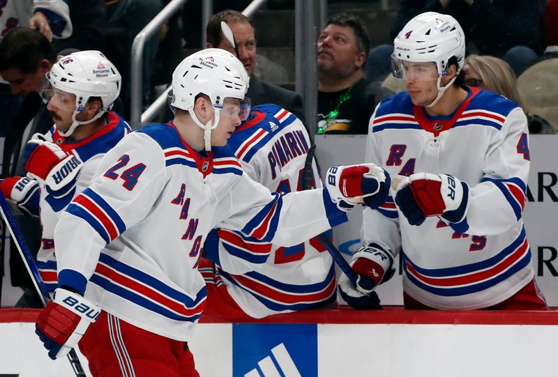 Mar 16, 2024; Pittsburgh, Pennsylvania, USA;  New York Rangers right wing Kaapo Kakko (24) celebrates his goal with the Rangers bench against the Pittsburgh Penguins during the first period at PPG Paints Arena. Mandatory Credit: Charles LeClaire-USA TODAY Sports