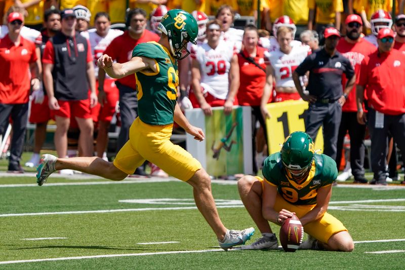 Sep 9, 2023; Waco, Texas, USA; Baylor Bears place kicker Isaiah Hankins (98) kicks a field against the Utah Utes during the second half at McLane Stadium. Mandatory Credit: Raymond Carlin III-USA TODAY Sports