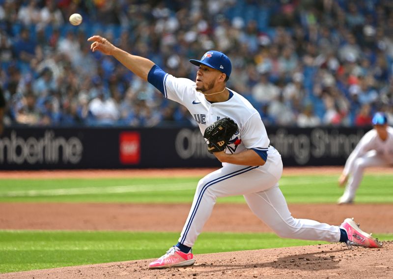 May 13, 2023; Toronto, Ontario, CAN; Toronto Blue Jays starting pitcher Jose Berrios (17) delivers a pitch against the Atlanta Braves in the second inning at Rogers Centre. Mandatory Credit: Dan Hamilton-USA TODAY Sports