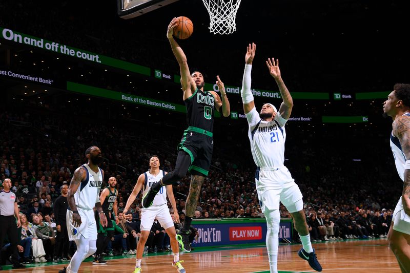 BOSTON, MA - MARCH 1: Jayson Tatum #0 of the Boston Celtics drives to the basket during the game against the Dallas Mavericks on March 1, 2024 at the TD Garden in Boston, Massachusetts. NOTE TO USER: User expressly acknowledges and agrees that, by downloading and or using this photograph, User is consenting to the terms and conditions of the Getty Images License Agreement. Mandatory Copyright Notice: Copyright 2024 NBAE  (Photo by Brian Babineau/NBAE via Getty Images)
