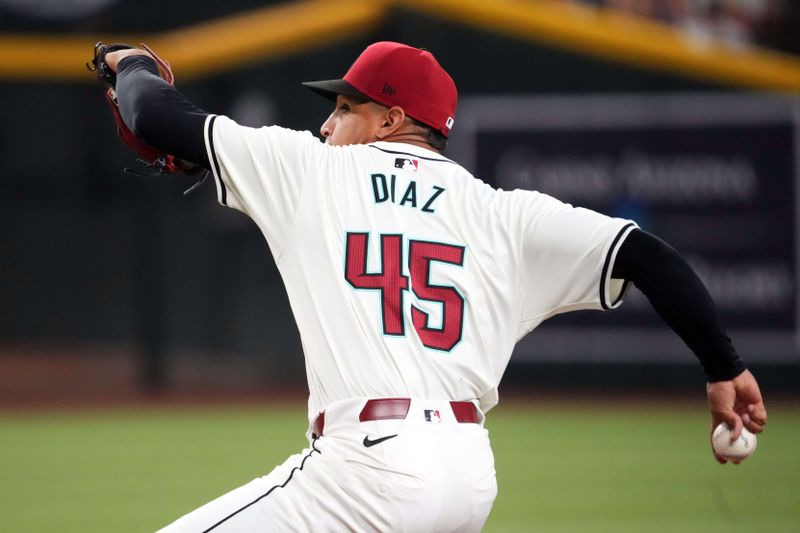 Jul 13, 2024; Phoenix, Arizona, USA; Arizona Diamondbacks pitcher Yilber Diaz (45) pitches against the Toronto Blue Jays during the first inning at Chase Field. Mandatory Credit: Joe Camporeale-USA TODAY Sports