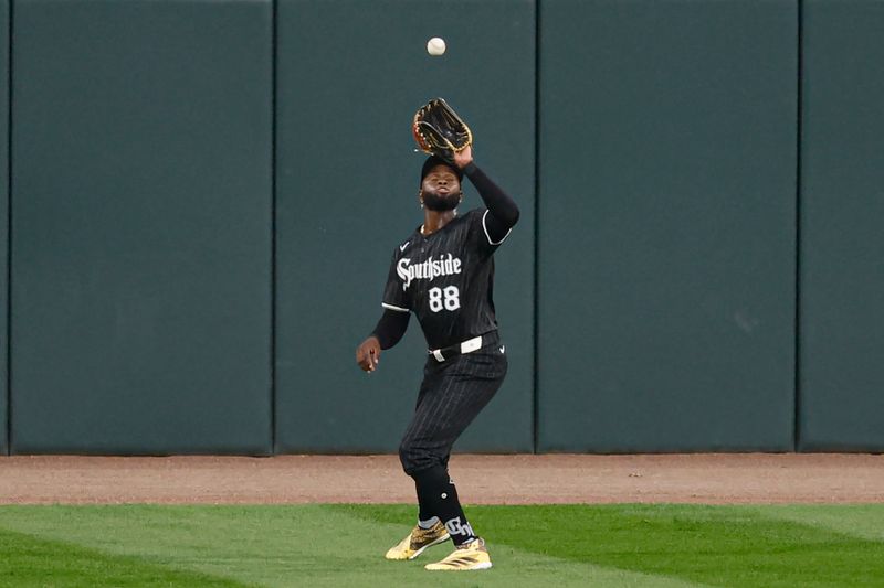 Aug 26, 2024; Chicago, Illinois, USA; Chicago White Sox outfielder Luis Robert Jr. (88) catches a fly ball hit by Detroit Tigers first baseman Spencer Torkelson (20) during the second inning at Guaranteed Rate Field. Mandatory Credit: Kamil Krzaczynski-USA TODAY Sports