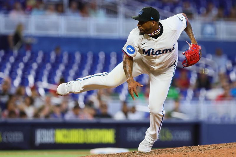 Apr 17, 2024; Miami, Florida, USA; Miami Marlins relief pitcher Sixto Sanchez (18) delivers a pitch against the San Francisco Giants during the ninth inning at loanDepot Park. Mandatory Credit: Sam Navarro-USA TODAY Sports