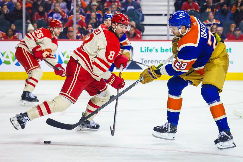 Jan 20, 2024; Calgary, Alberta, CAN; Edmonton Oilers center Leon Draisaitl (29) controls the puck against Calgary Flames defenseman Chris Tanev (8) during the third period at Scotiabank Saddledome. Mandatory Credit: Sergei Belski-USA TODAY Sports