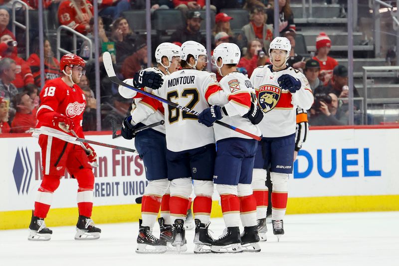 Mar 2, 2024; Detroit, Michigan, USA; Florida Panthers defenseman Brandon Montour (62) celebrates with teammates after scoring in the second period against the Detroit Red Wings at Little Caesars Arena. Mandatory Credit: Rick Osentoski-USA TODAY Sports