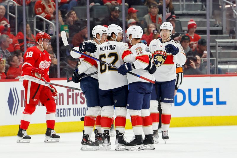 Mar 2, 2024; Detroit, Michigan, USA; Florida Panthers defenseman Brandon Montour (62) celebrates with teammates after scoring in the second period against the Detroit Red Wings at Little Caesars Arena. Mandatory Credit: Rick Osentoski-USA TODAY Sports