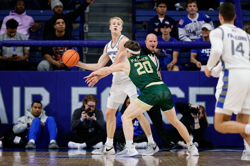 Mar 9, 2024; Colorado Springs, Colorado, USA; Air Force Falcons forward Rytis Petraitis (31) looks to pass the ball to forward Beau Becker (14) as Colorado State Rams guard Joe Palmer (20) defends in the first half at Clune Arena. Mandatory Credit: Isaiah J. Downing-USA TODAY Sports