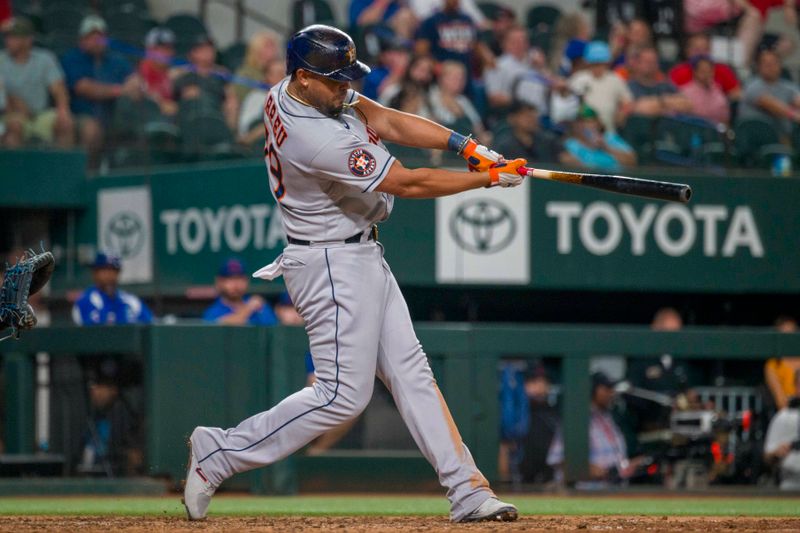 Sep 6, 2023; Arlington, Texas, USA; Houston Astros first baseman Jose Abreu (79) hits a three run home run against the Texas Rangers during the ninth inning at Globe Life Field. Mandatory Credit: Jerome Miron-USA TODAY Sports