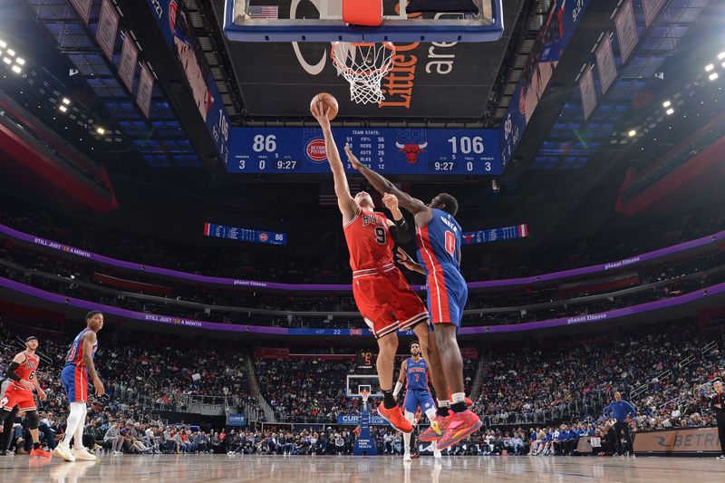 DETROIT, MI - APRIL 11: Nikola Vucevic #9 of the Chicago Bulls shoots the ball during the game against the Detroit Pistons on April 11, 2024 at Little Caesars Arena in Detroit, Michigan. NOTE TO USER: User expressly acknowledges and agrees that, by downloading and/or using this photograph, User is consenting to the terms and conditions of the Getty Images License Agreement. Mandatory Copyright Notice: Copyright 2024 NBAE (Photo by Chris Schwegler/NBAE via Getty Images)