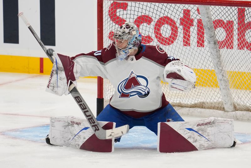 Jan 13, 2024; Toronto, Ontario, CAN; Colorado Avalanche goaltender Ivan Prosvetov (50) makes a save during the warm up before a game against the Toronto Maple Leafs at Scotiabank Arena. Mandatory Credit: John E. Sokolowski-USA TODAY Sports