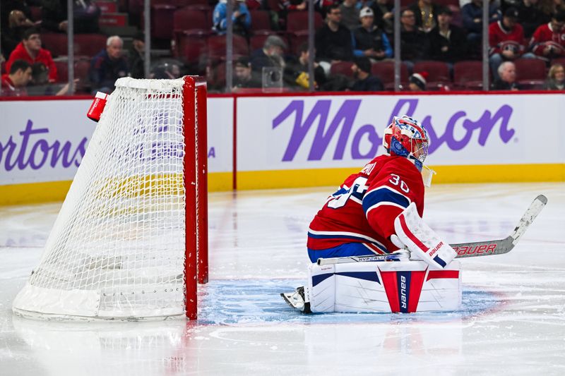 Nov 23, 2024; Montreal, Quebec, CAN; Montreal Canadiens goalie Cayden Primeau (30) stretches as he enters the game against the Las Vegas Golden Knights during the third period at Bell Centre. Mandatory Credit: David Kirouac-Imagn Images