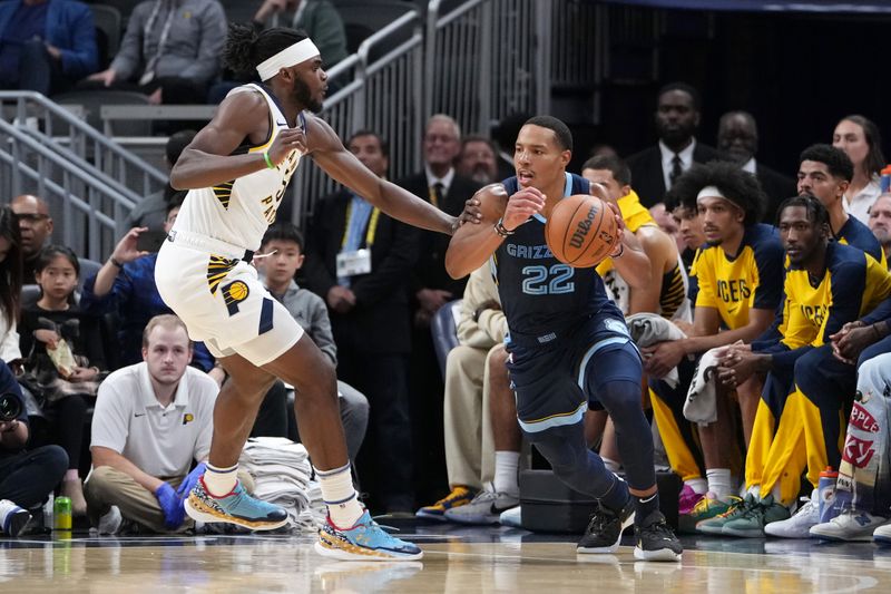 INDIANAPOLIS, INDIANA - OCTOBER 14: Desmond Bane #22 of the Memphis Grizzlies dribbles the ball against Jarace Walker #5 of the Indiana Pacers in the second quarter of a preseason game at Gainbridge Fieldhouse on October 14, 2024 in Indianapolis, Indiana. NOTE TO USER: User expressly acknowledges and agrees that, by downloading and or using this photograph, User is consenting to the terms and conditions of the Getty Images License Agreement. (Photo by Dylan Buell/Getty Images)