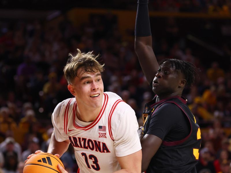 Jan 31, 2026; Tempe, Arizona, USA; Arizona Wildcats center Motiejus Krivas (13) against the Arizona State Sun Devils in the first half at Desert Financial Arena. Mandatory Credit: Mark J. Rebilas-Imagn Images