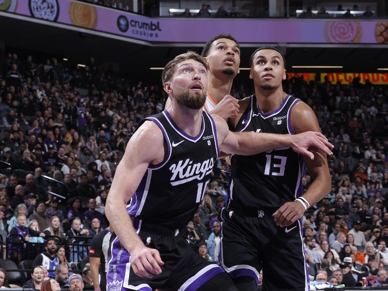 SACRAMENTO, CA - FEBRUARY 22: Domantas Sabonis #10 of the Sacramento Kings, Victor Wembanyama #1 of the San Antonio Spurs and Keegan Murray #13 of the Sacramento Kings wait for a rebound during the game on February 22, 2024 at Golden 1 Center in Sacramento, California. NOTE TO USER: User expressly acknowledges and agrees that, by downloading and or using this Photograph, user is consenting to the terms and conditions of the Getty Images License Agreement. Mandatory Copyright Notice: Copyright 2023 NBAE (Photo by Rocky Widner/NBAE via Getty Images)