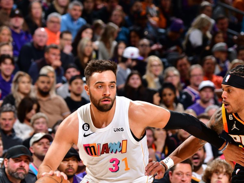 PHOENIX, AZ - JANUARY 6: Max Strus #31 of the Miami Heat drives to the basket during the game against the Phoenix Suns on January 6, 2023 at Footprint Center in Phoenix, Arizona. NOTE TO USER: User expressly acknowledges and agrees that, by downloading and or using this photograph, user is consenting to the terms and conditions of the Getty Images License Agreement. Mandatory Copyright Notice: Copyright 2022 NBAE (Photo by Barry Gossage/NBAE via Getty Images)