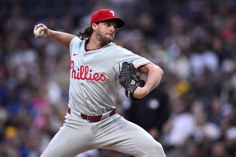 Apr 26, 2024; San Diego, California, USA; Philadelphia Phillies starting pitcher Aaron Nola (27) throws a pitch during the first inning against the San Diego Padres at Petco Park. Mandatory Credit: Orlando Ramirez-USA TODAY Sports