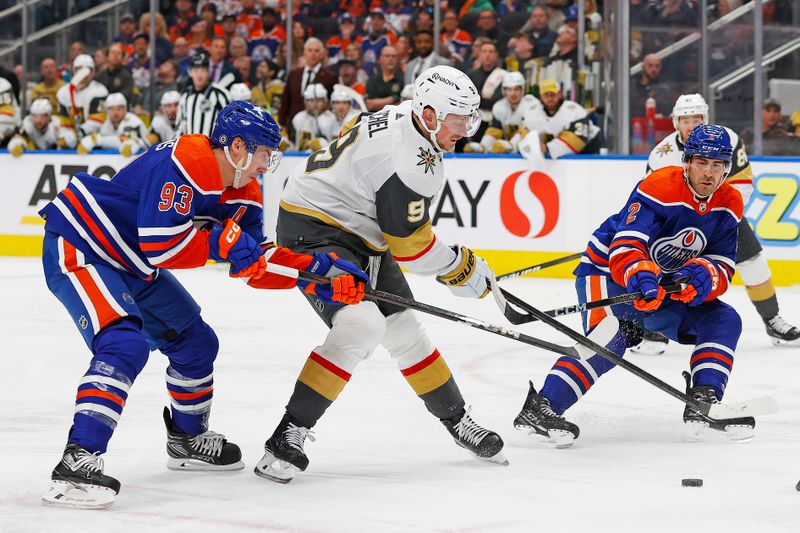 Apr 10, 2024; Edmonton, Alberta, CAN; Edmonton Oilers forward Ryan Nugent-Hopkins (93) tries knock a puck away from Vegas Golden Knights forward Jack Eichel (9) during the second period at Rogers Place. Mandatory Credit: Perry Nelson-USA TODAY Sports