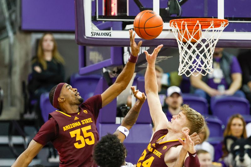 Jan 26, 2023; Seattle, Washington, USA; Arizona State Sun Devils guard Devan Cambridge (35) tips a rebound in as forward Duke Brennan (24) converges on the ball during the second half against the Washington Huskies at Alaska Airlines Arena at Hec Edmundson Pavilion. Mandatory Credit: Joe Nicholson-USA TODAY Sports